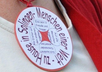 Plakette Menschen einer Welt - zu Hause in Solingen